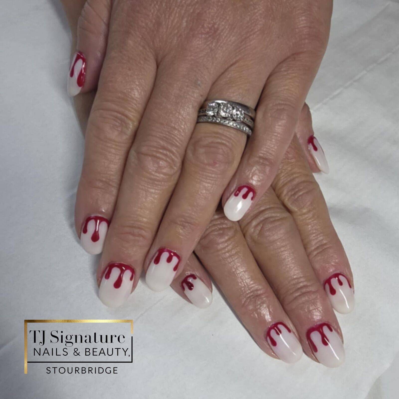 Blood-drip Halloween nails – bold, spooky and perfectly polished.