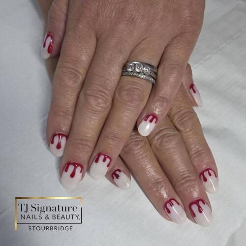 Blood-drip Halloween nails – bold, spooky and perfectly polished.