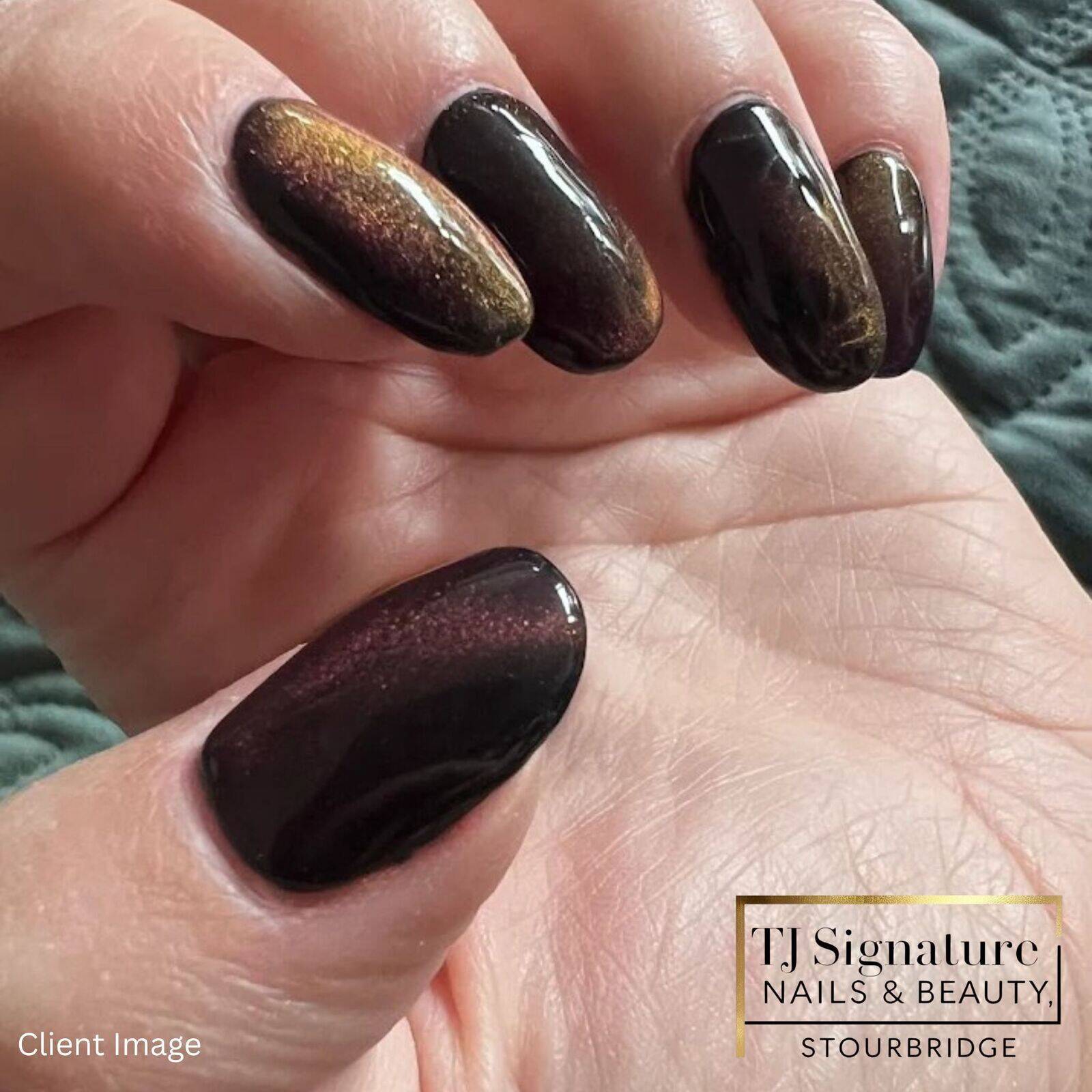 ✨ Client Image ✨ Cat-eye polish over builder gel — the same set captured in two different lights. Rich tones shift and shimmer beautifully, showing just how stunning this effect can be.