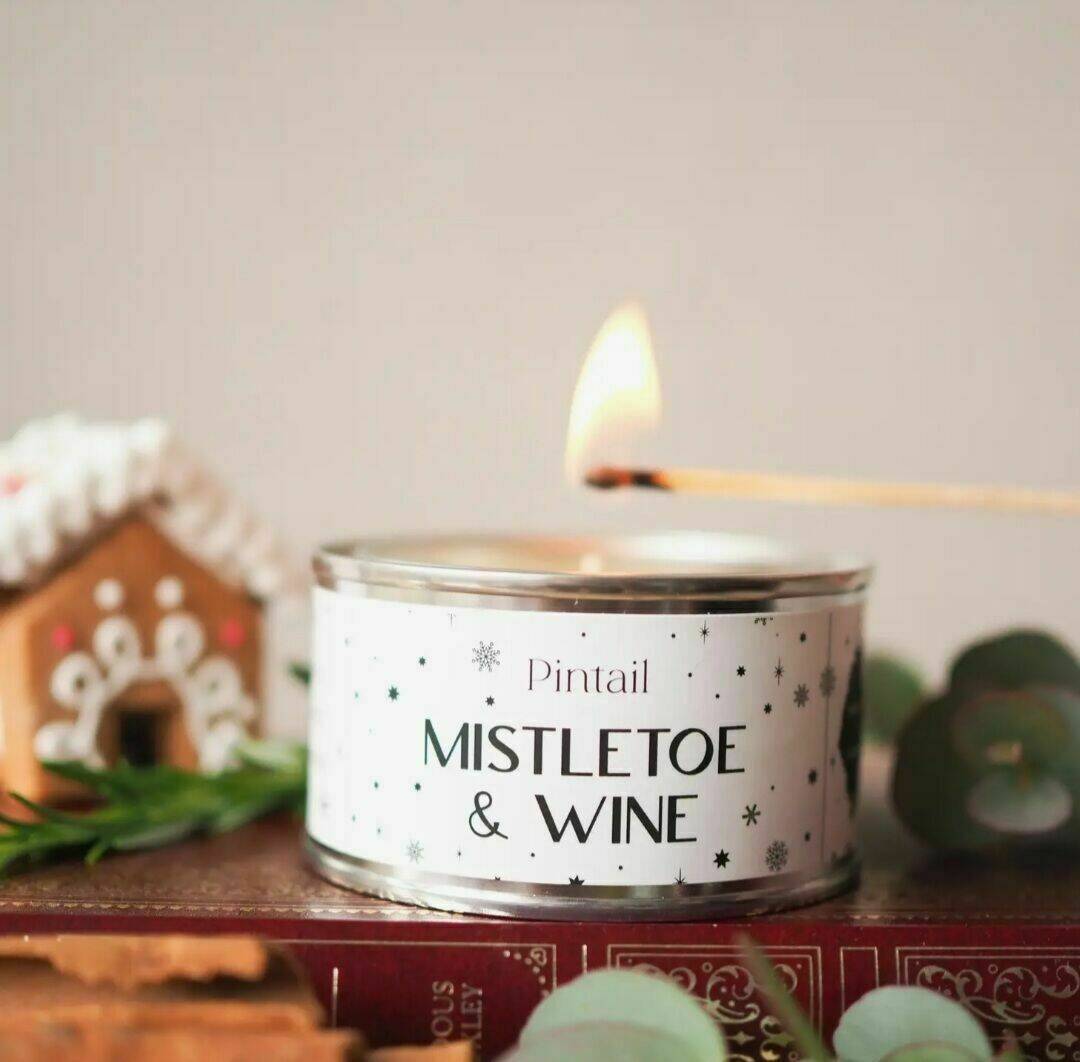 Mistletoe and wine candle